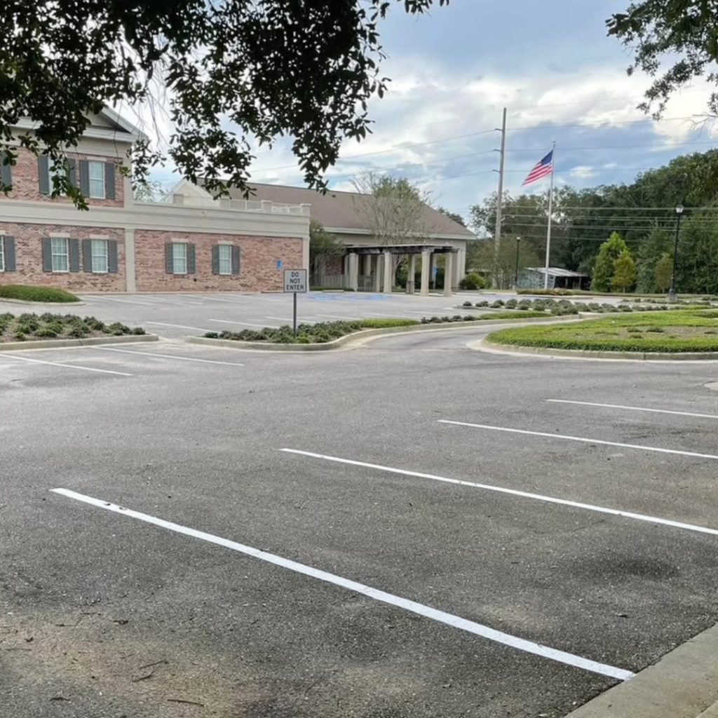 Freshly striped parking lot in Gulfport, MS, by Striping Bros