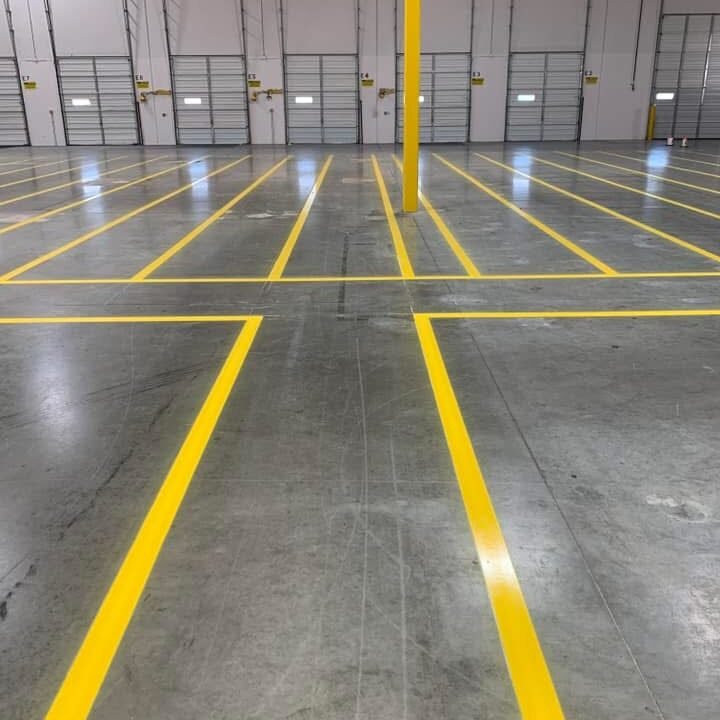 "Warehouse parking lot with precise striping in New Orleans, LA.