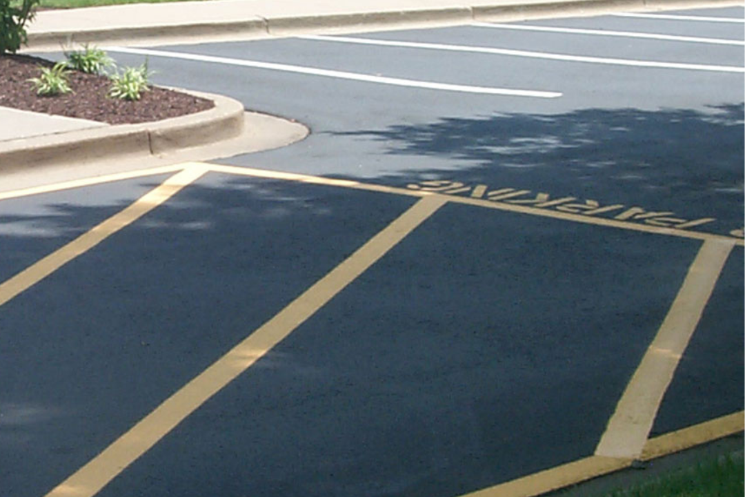 Blog 1 Bright yellow safety markings in a busy parking lot in Hattiesburg, MS